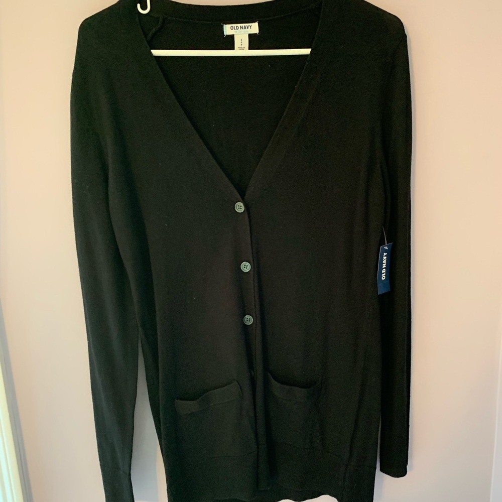 black cardigan.